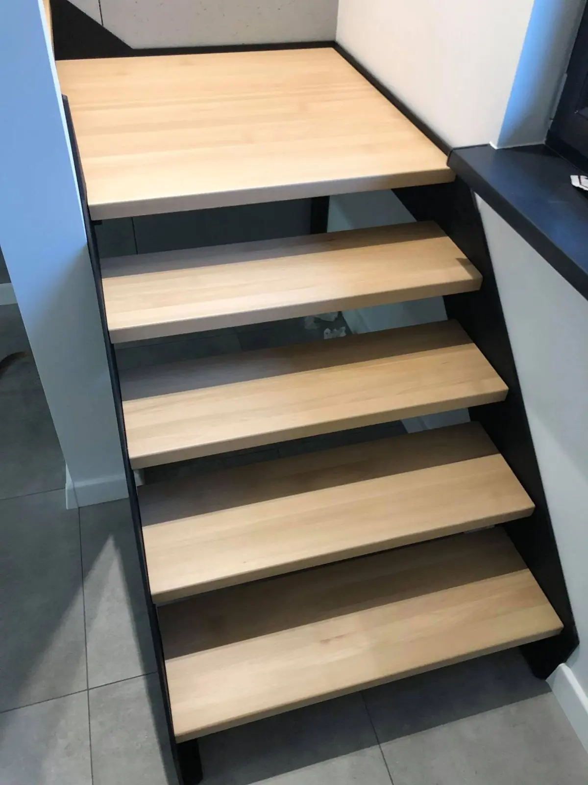 Steel-frame stairs with wooden treads