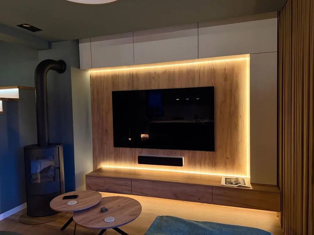 TV wall with wood panelling and LED